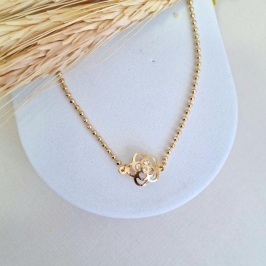 Choker bolinha com flor vazada com zircônias