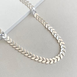 Choker escamada