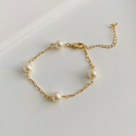 Pulseira pérolas na cartier