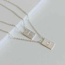 Escapulário cruz/olho