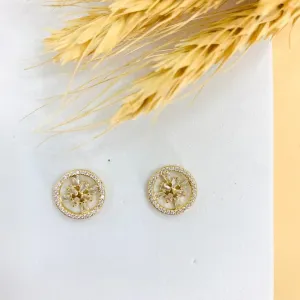 Brinco circulo com flor no meio