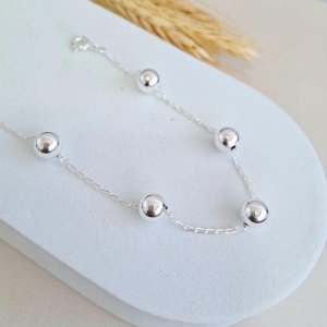 Pulseira com bolinhas