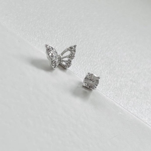 Dupla borboleta cravejada e ponto de luz