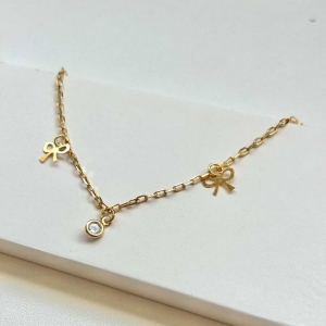 Tornozeleira laço e ponto de luz