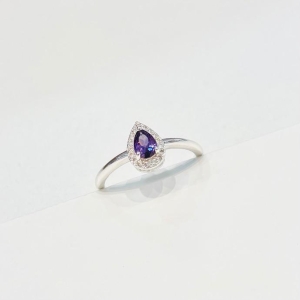 Anel gota zirconia lilás com cravejado