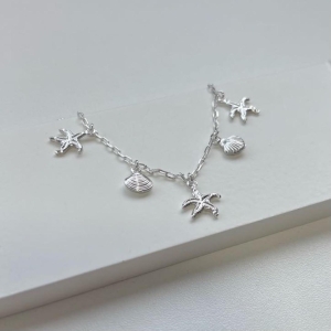 Pulseira conchas e estrela do mar