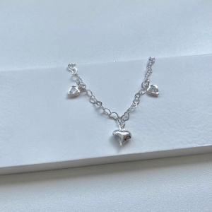 Pulseira coração com pontos de luz