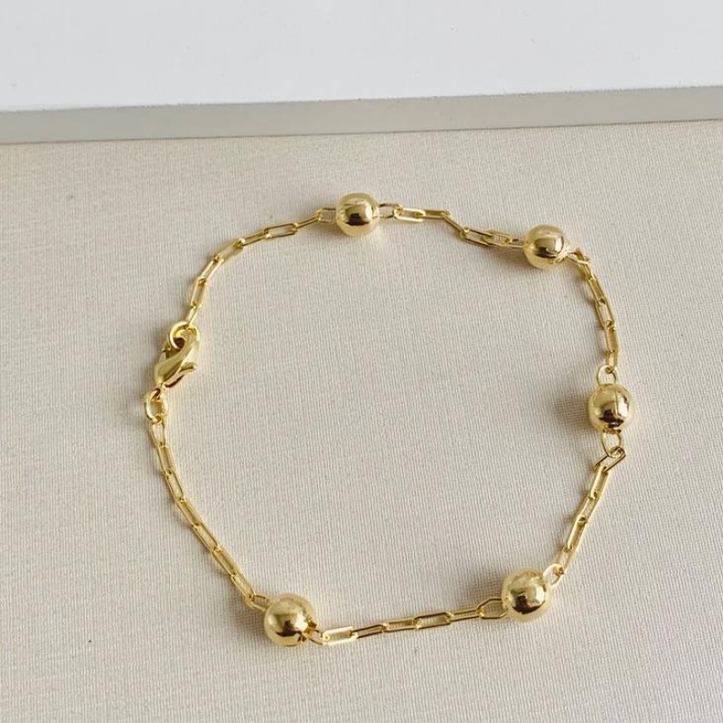 Pulseira cartier com bolinhas