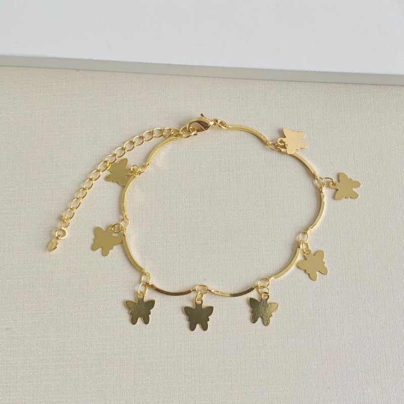 Pulseira com borboletas penduradas