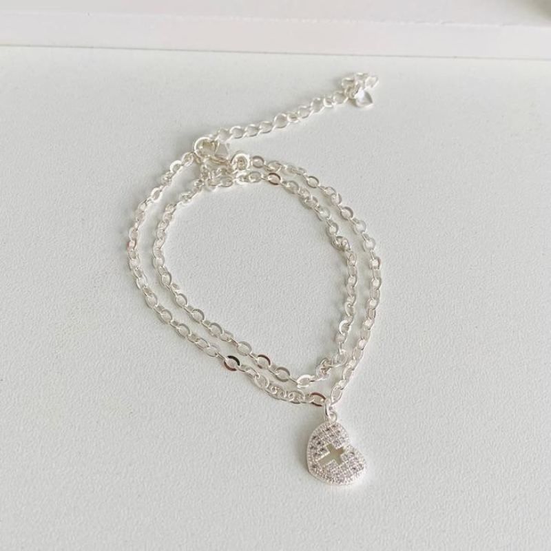 Pulseira dupla com coração cravejado