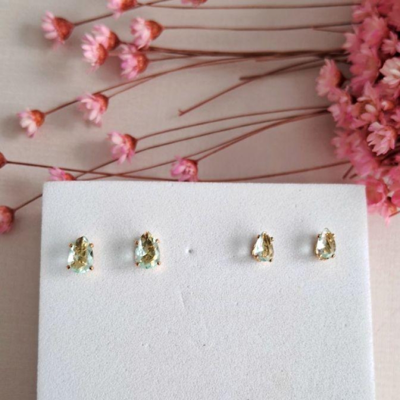 Dupla gota verde água dourada