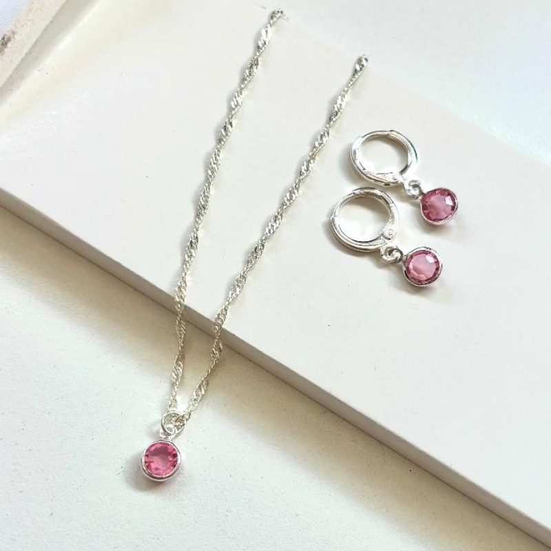 Conjunto brilhante ponto de luz rosa