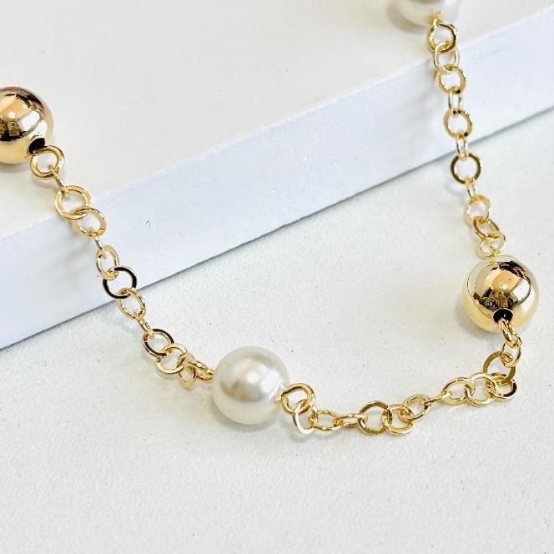 Pulseira pérolas e bolinhas elos
