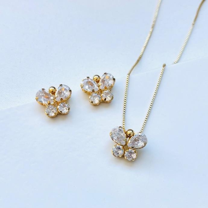 Conjunto borboletas em zircônias cristais