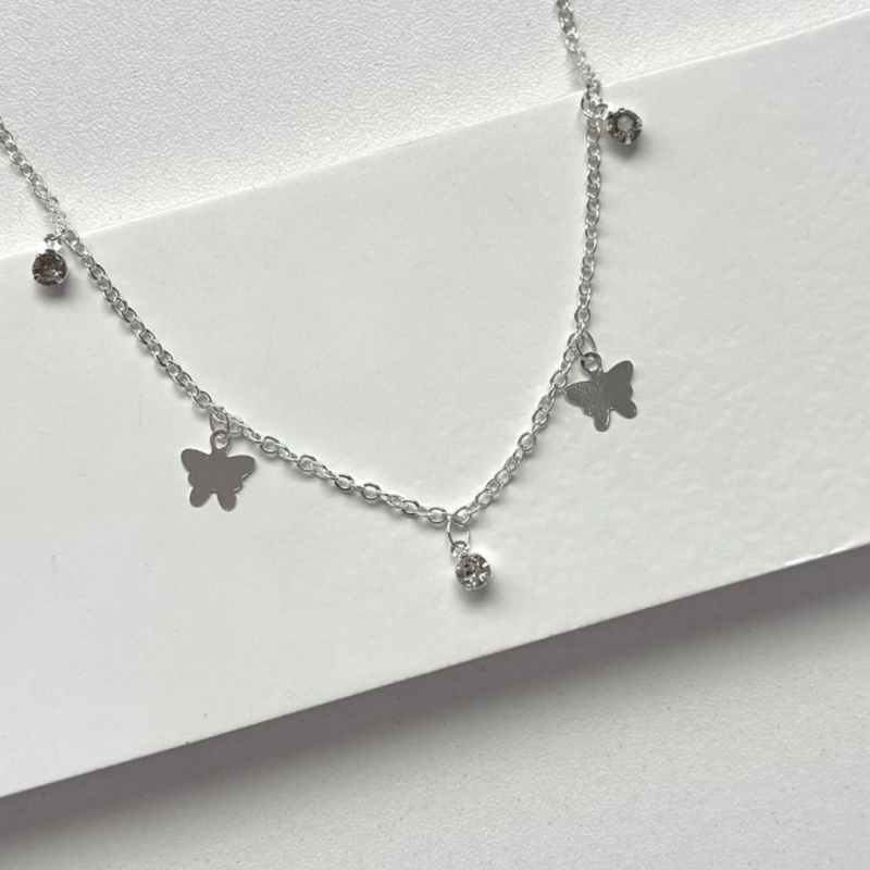 Choker borboletas e pontos de luz