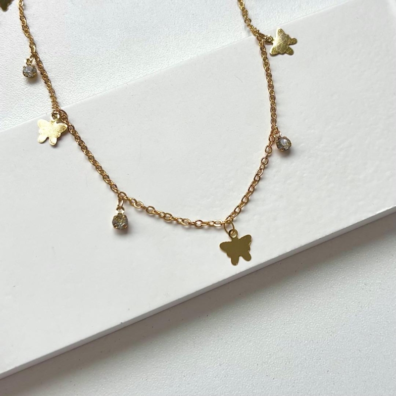 Choker borboletas e pontos de luz