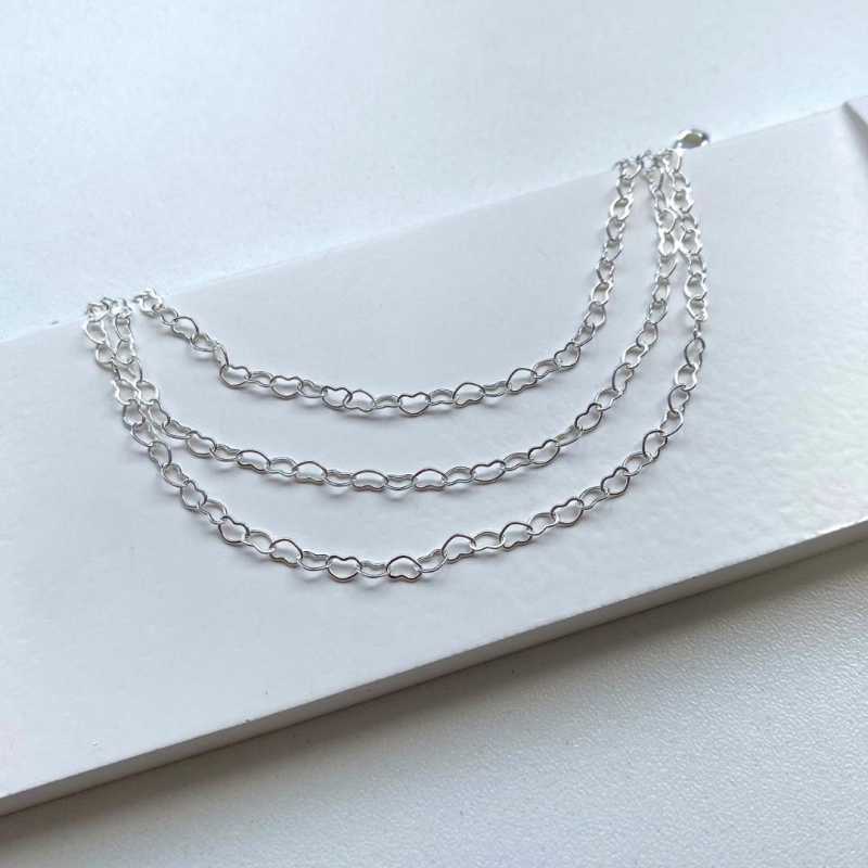 Pulseira tripla elos corações