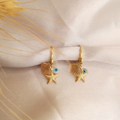 Brinco argolinha itens do mar com olho grego