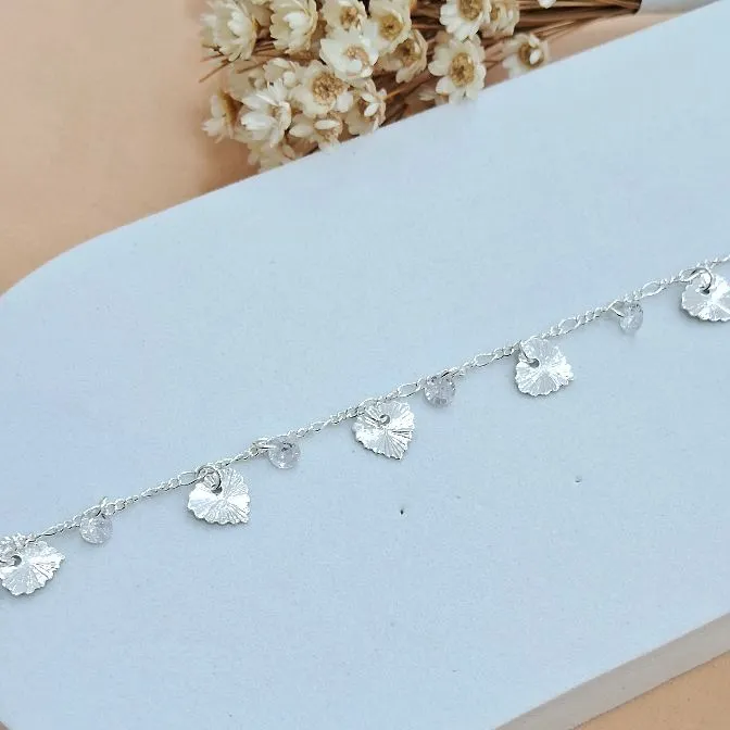 Pulseira folhas e pontos de luz