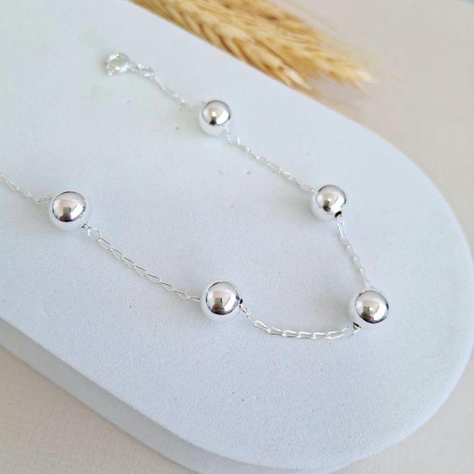 Pulseira com bolinhas