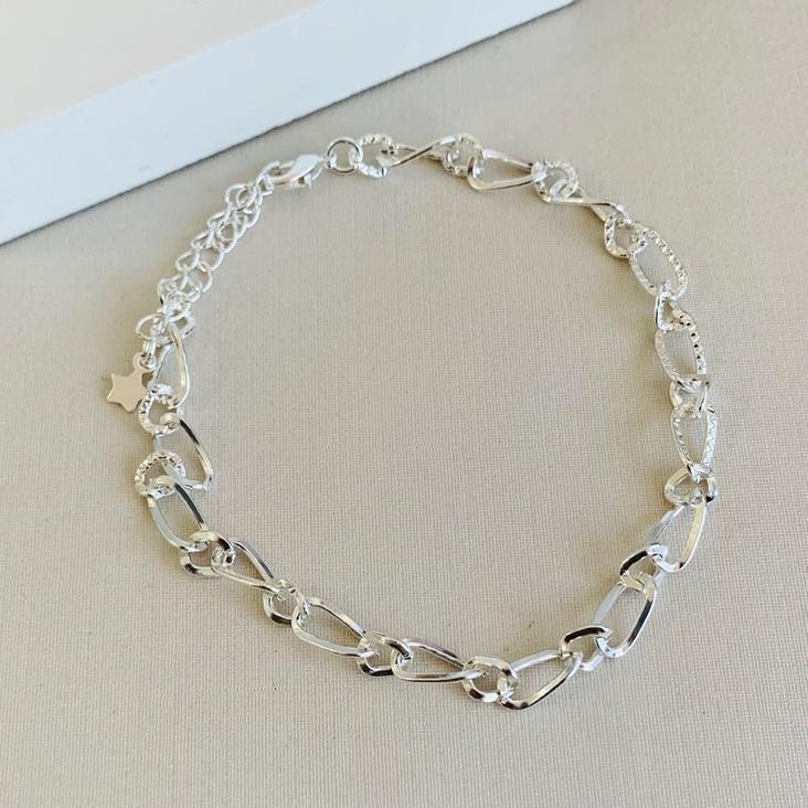Pulseira elos torcidos diamantados
