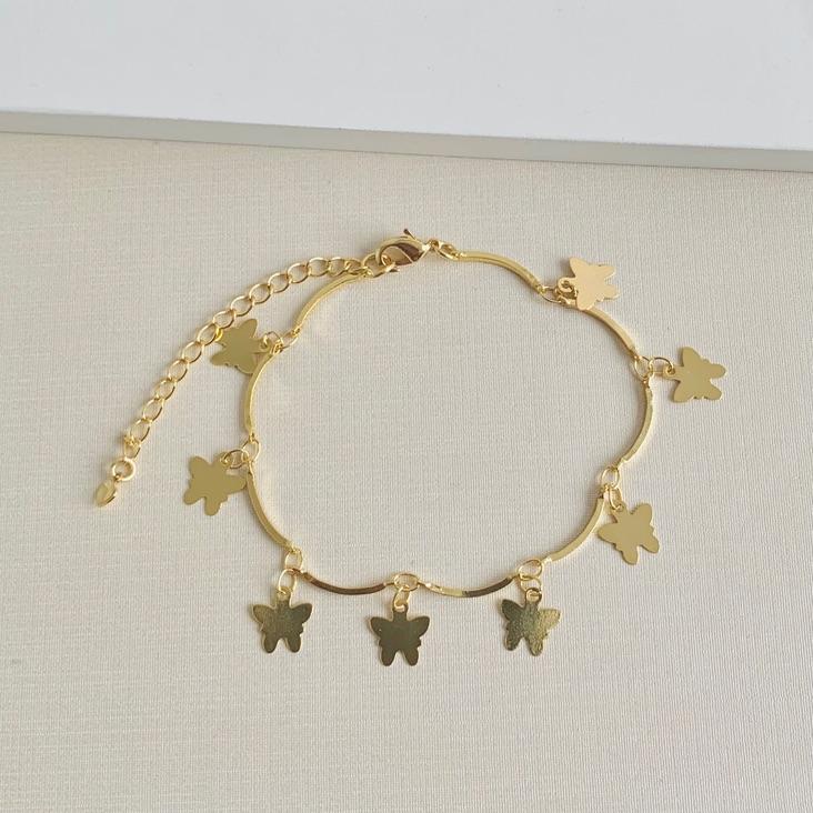 Pulseira com borboletas penduradas