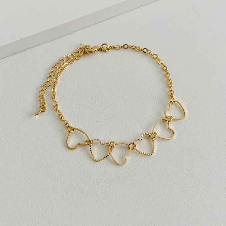 Pulseira corações vazados