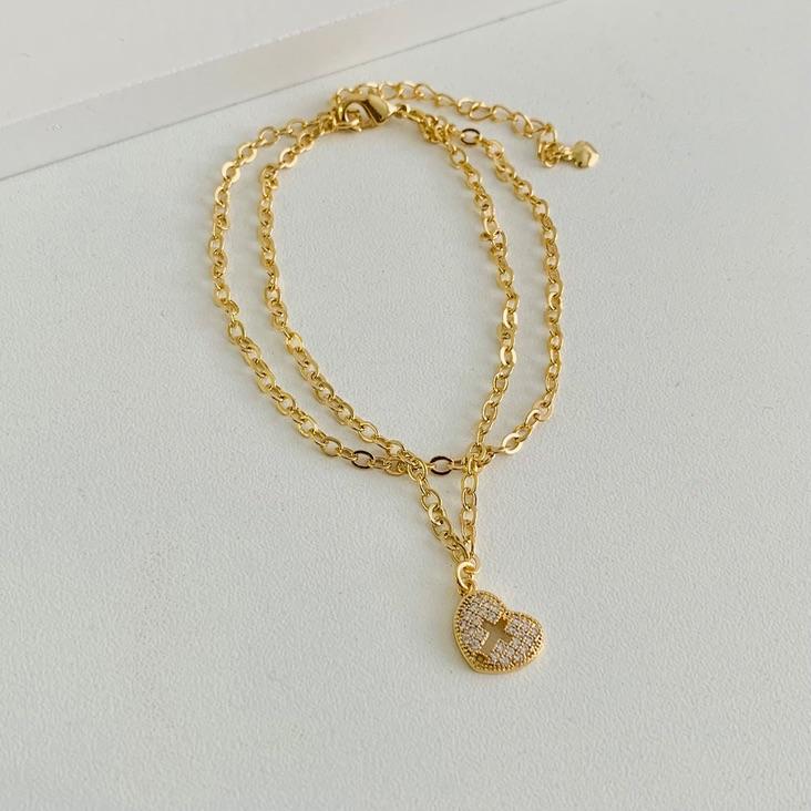 Pulseira dupla com coração cravejado