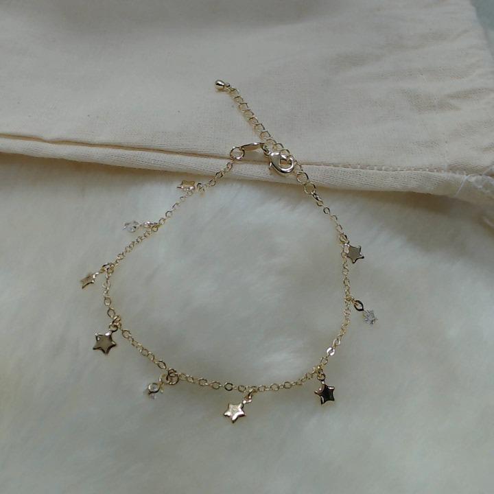 Pulseira com estrelas lisas e com zircônias