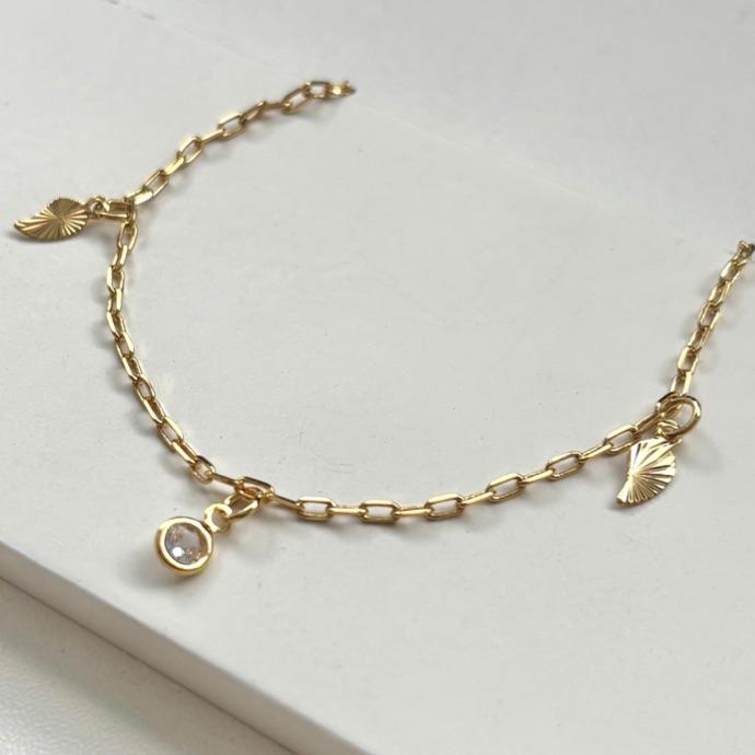 Tornozeleira penduricalho ponto de luz e folha