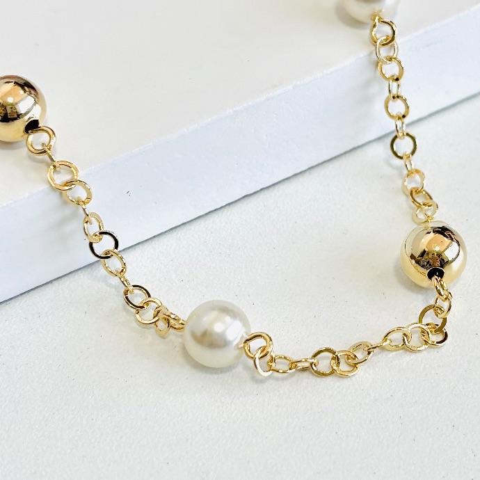 Pulseira pérolas e bolinhas elos