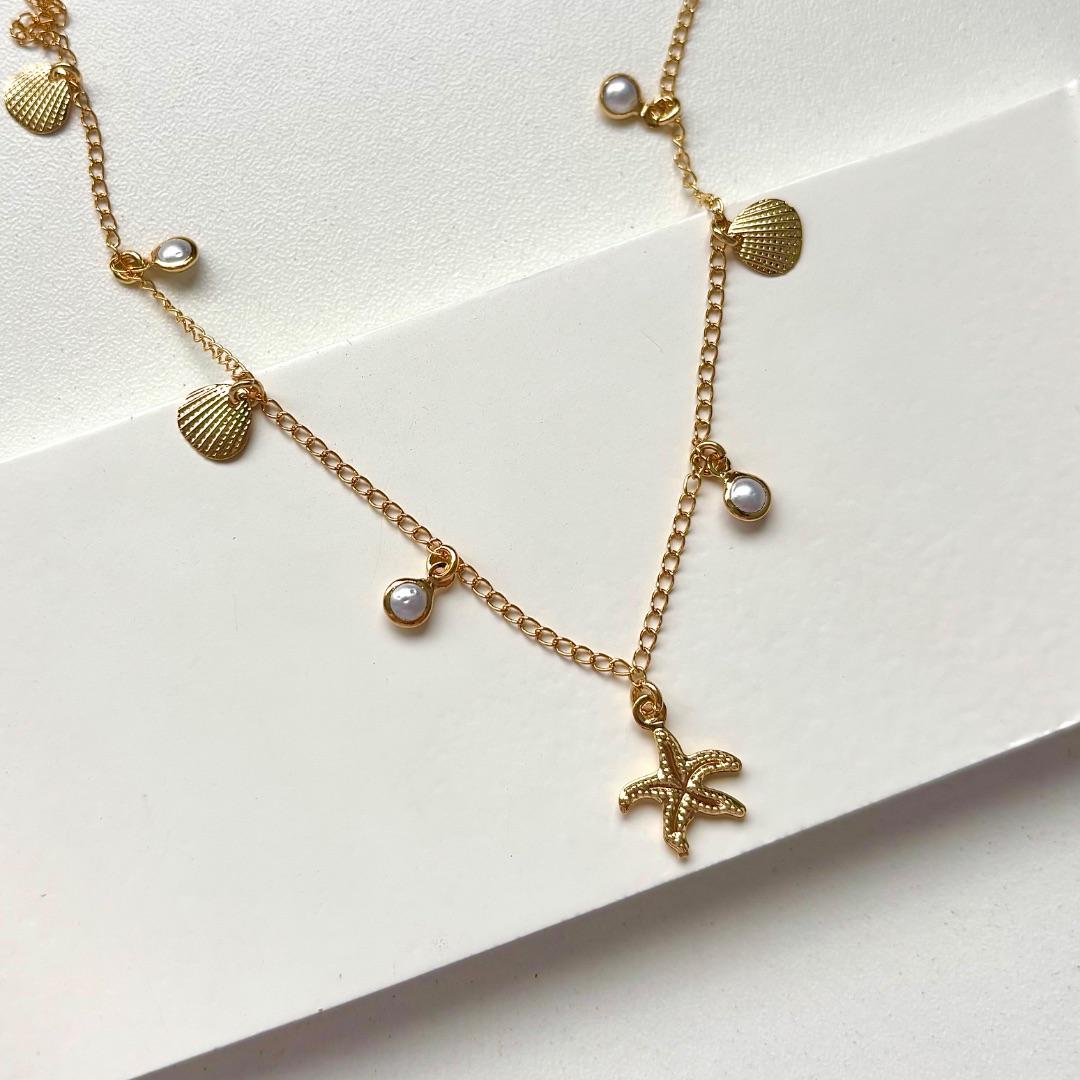 Choker estrela do mar com conchas e pérolas