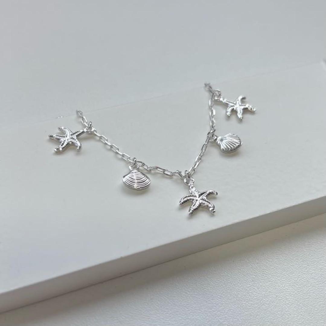Pulseira conchas e estrela do mar